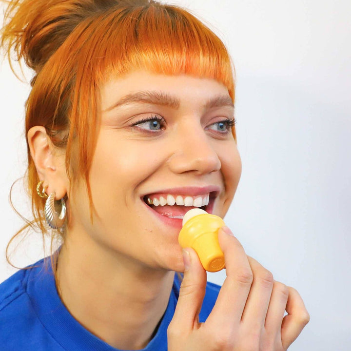 Orange Dreamsicle Lip Balm in an ice cream cone shape.