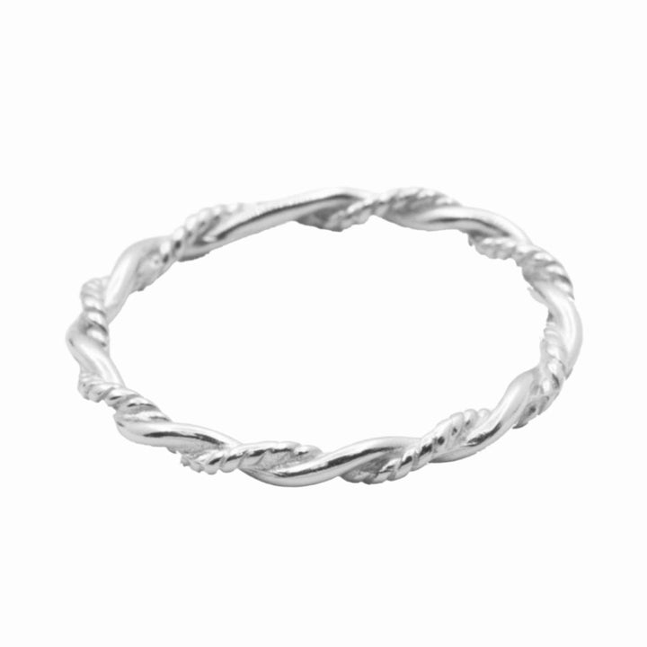A silver ring with a twisted, rope-like design.