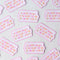 Everything Is Going To Be Okay-ish Sticker, a pink sticker with colourful words reading 