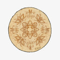 The Birch Bark Reversible Blanket by Mini Tipi, featuring a delicate white birch bark-inspired pattern on a grey background, hanging from a wooden rod. This reversible blanket is available in Ottawa, Ontario, Canada.