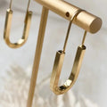 The Gold Minimalist Hoop is an ultra modern and sleek design and will be sure to keep you looking top notch. Nickel free and 14K gold plated.  Made in Canada. Close Up product image