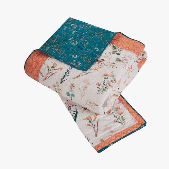 An image of a floral quilt set.