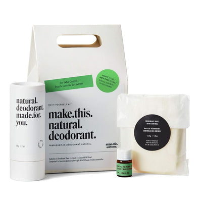 A DIY kit that says Make This Natural Deodorant on the front. The white box sits behind everything that's included to make one tube of natural deodorant.