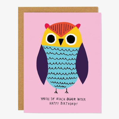 A pink card with colourful owl and quote 