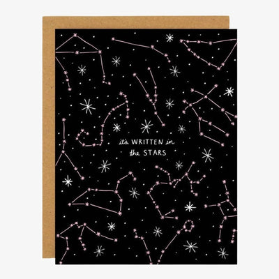 A black card with pink and white star constellations and quote 