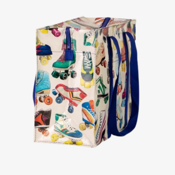 A large tote bag with a playful roller skate pattern. The bag is white with a variety of colorful roller skates printed all over it. The skates are in different styles and colors, and some have laces while others have buckles. The bag has blue handles.