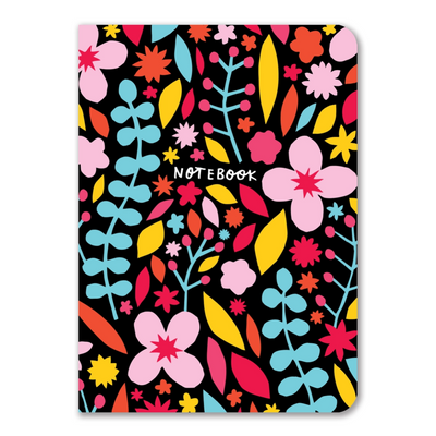 A black paperback notebook with baby pink, pale blue, yellow, hot pink and orange flowers and plants. The word notebook is written in white.