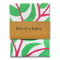 Green and pink floral pattern tea towel in brown packaging that says Badger & Burke, 100% cotton tea towel.