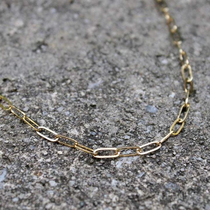 A gold rectangle chain necklace by Vintage Acorn