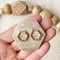 The Gold Hexi Huggies close up image Made from brass- plated with 18k gold. Nickel free and safe for sensitive ears.