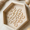 The Gold Hexi Huggies close up image Made from brass- plated with 18k gold. Nickel free and safe for sensitive ears.