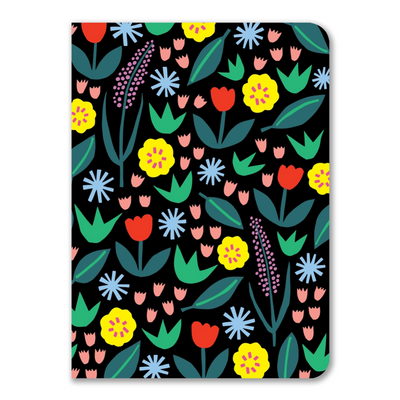 A black paperback journal with red tulips, lavender, yellow, pale blue, and peach flowers, and green leaves.