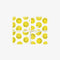 white gift wrap with yellow smiley faces all over